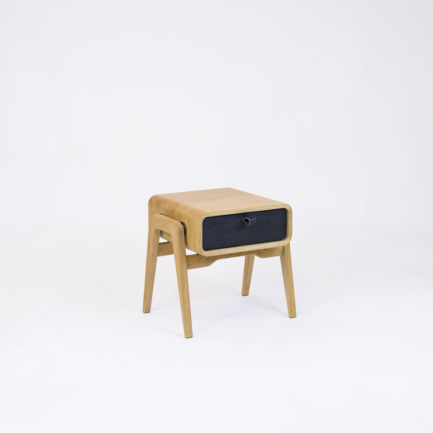 Low desk and storage bench nm11L. The main corpus is crafted from solid Norwegian oak, featuring 1 drawer with black oak front.