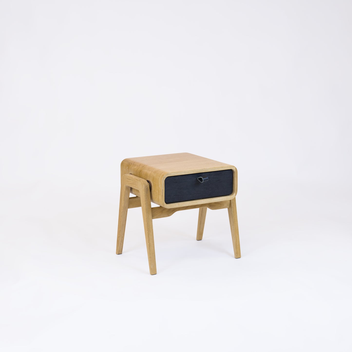 Low desk and storage bench nm11L. The main corpus is crafted from solid Norwegian oak, featuring 1 drawer with black oak front.