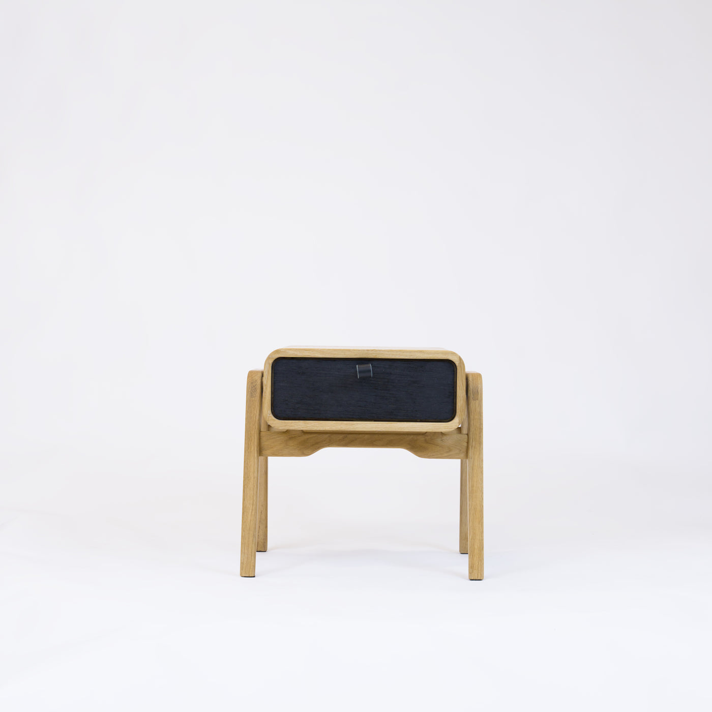 Low desk and storage bench nm11L. The main corpus is crafted from solid Norwegian oak, featuring 1 drawer with black oak front.