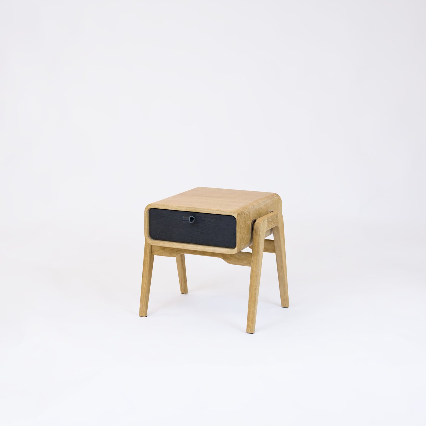 Low desk and storage bench nm11L. The main corpus is crafted from solid Norwegian oak, featuring 1 drawer with black oak front.
