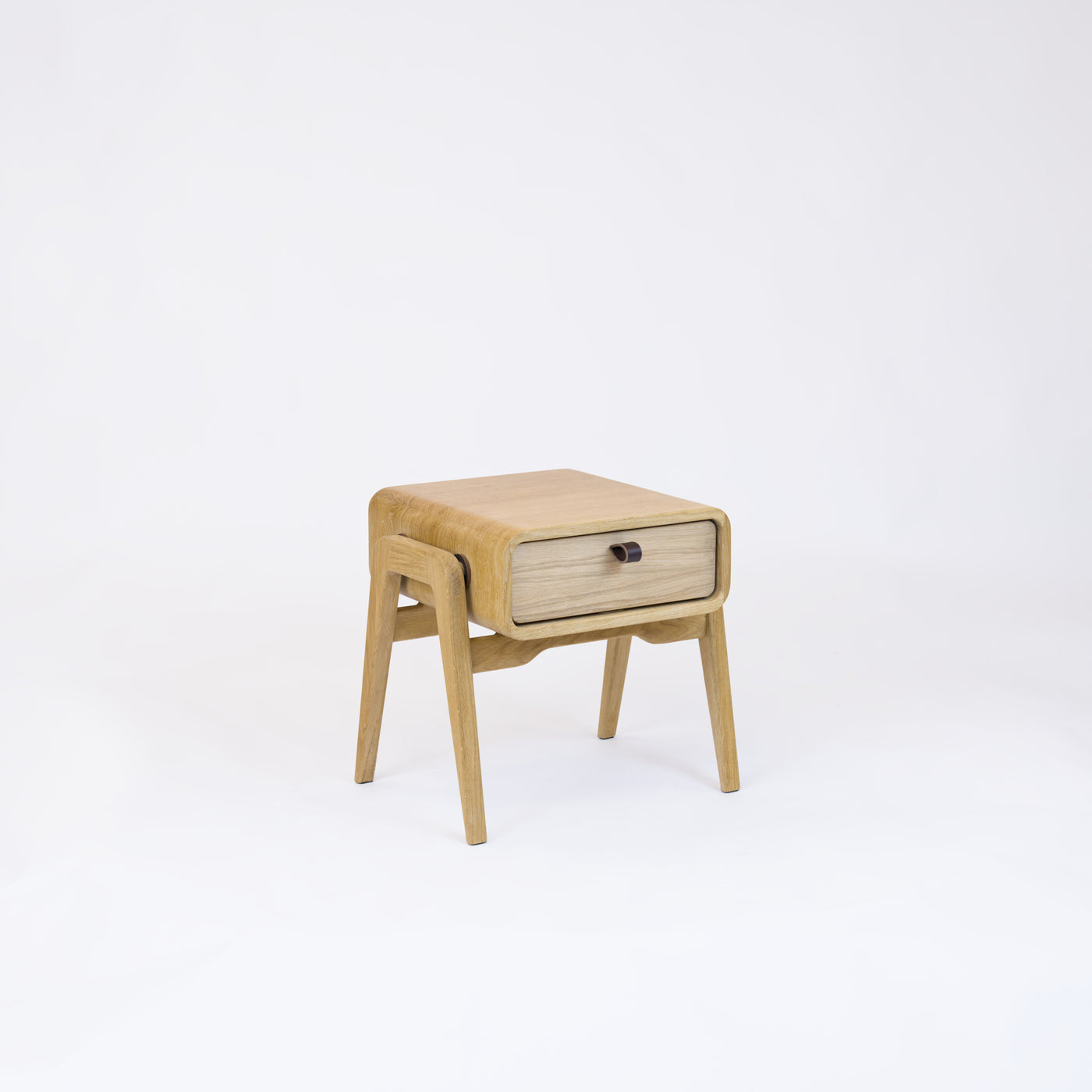 Low desk and storage bench nm11L. The main corpus is crafted from solid Norwegian oak, featuring 1 drawer with natural oak front.