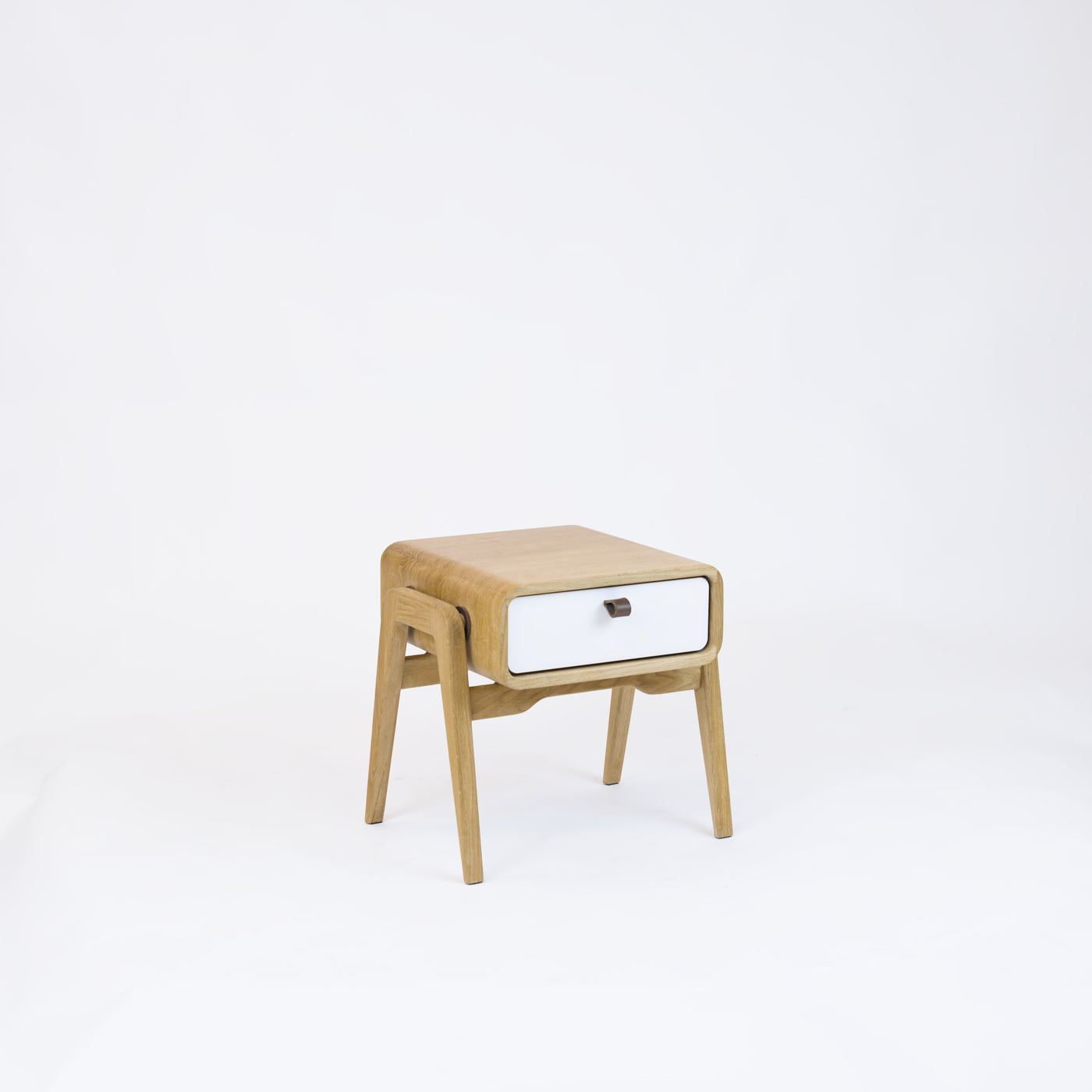 Low desk and storage bench nm11L. The main corpus is crafted from solid Norwegian oak, featuring 1 drawer with white front.