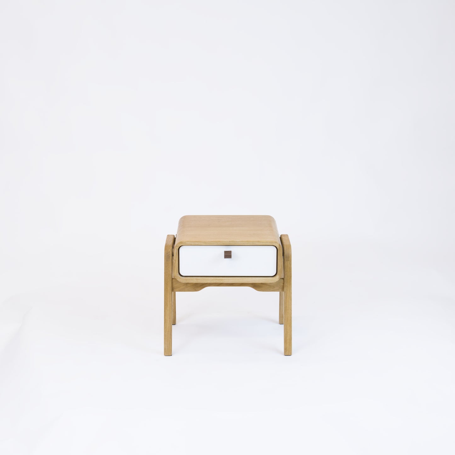 Low desk and storage bench nm11L. The main corpus is crafted from solid Norwegian oak, featuring 1 drawer with white front.