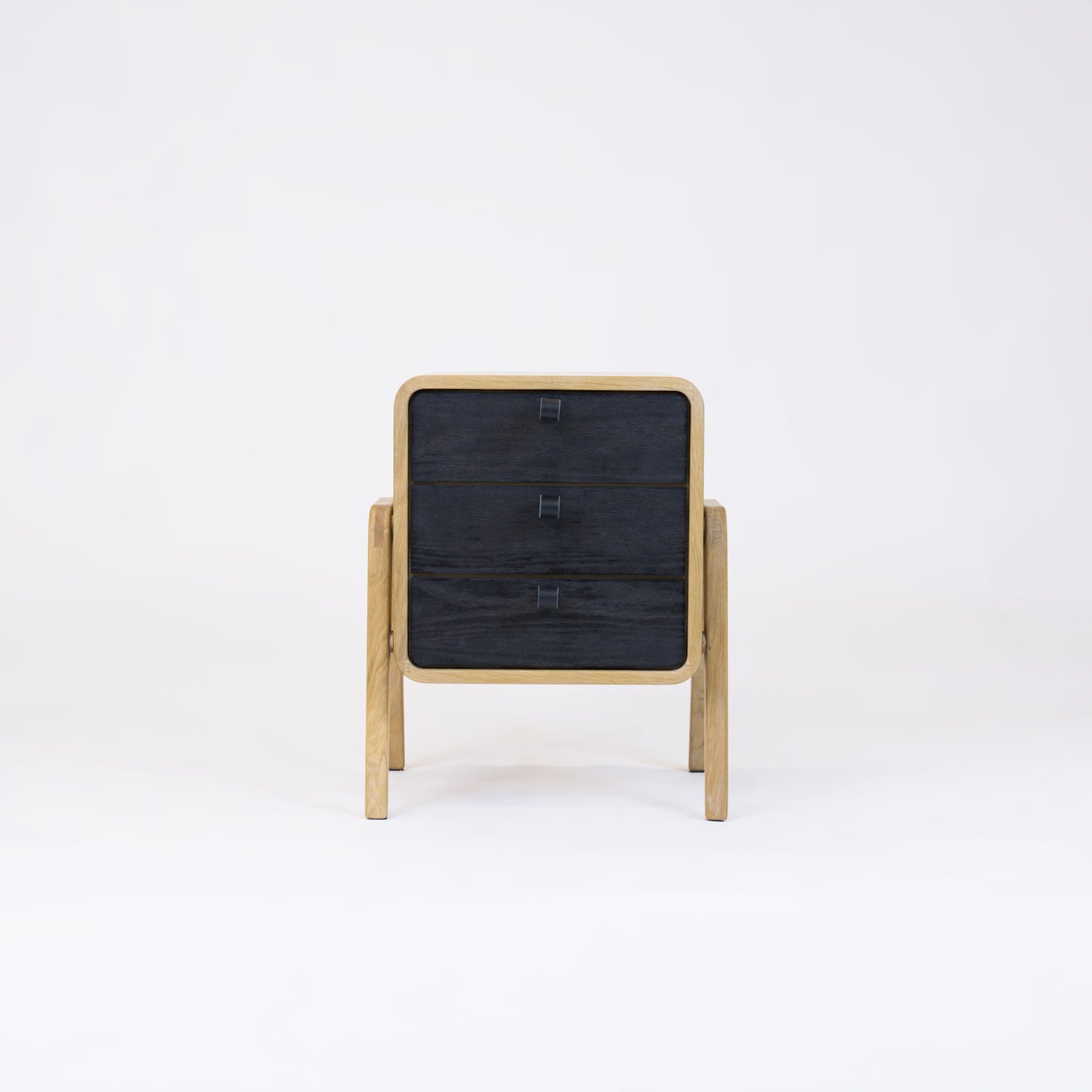 Low drawer unit nm31L. The main corpus is crafted from solid Norwegian oak, featuring 3 drawers with black oak front.