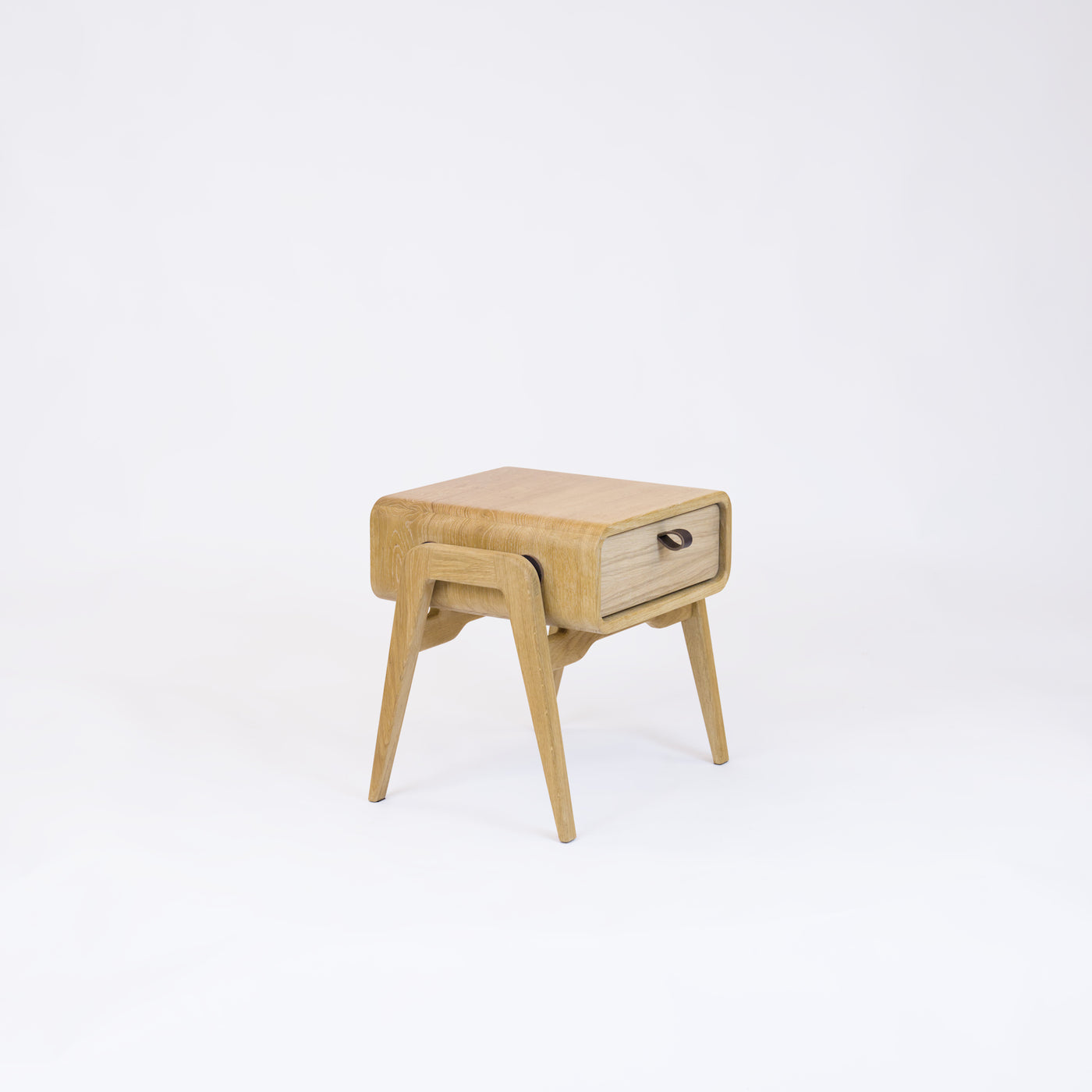 Low nightstand nm11L. The main corpus is crafted from solid Norwegian oak, featuring 1 drawer with natural oak front.