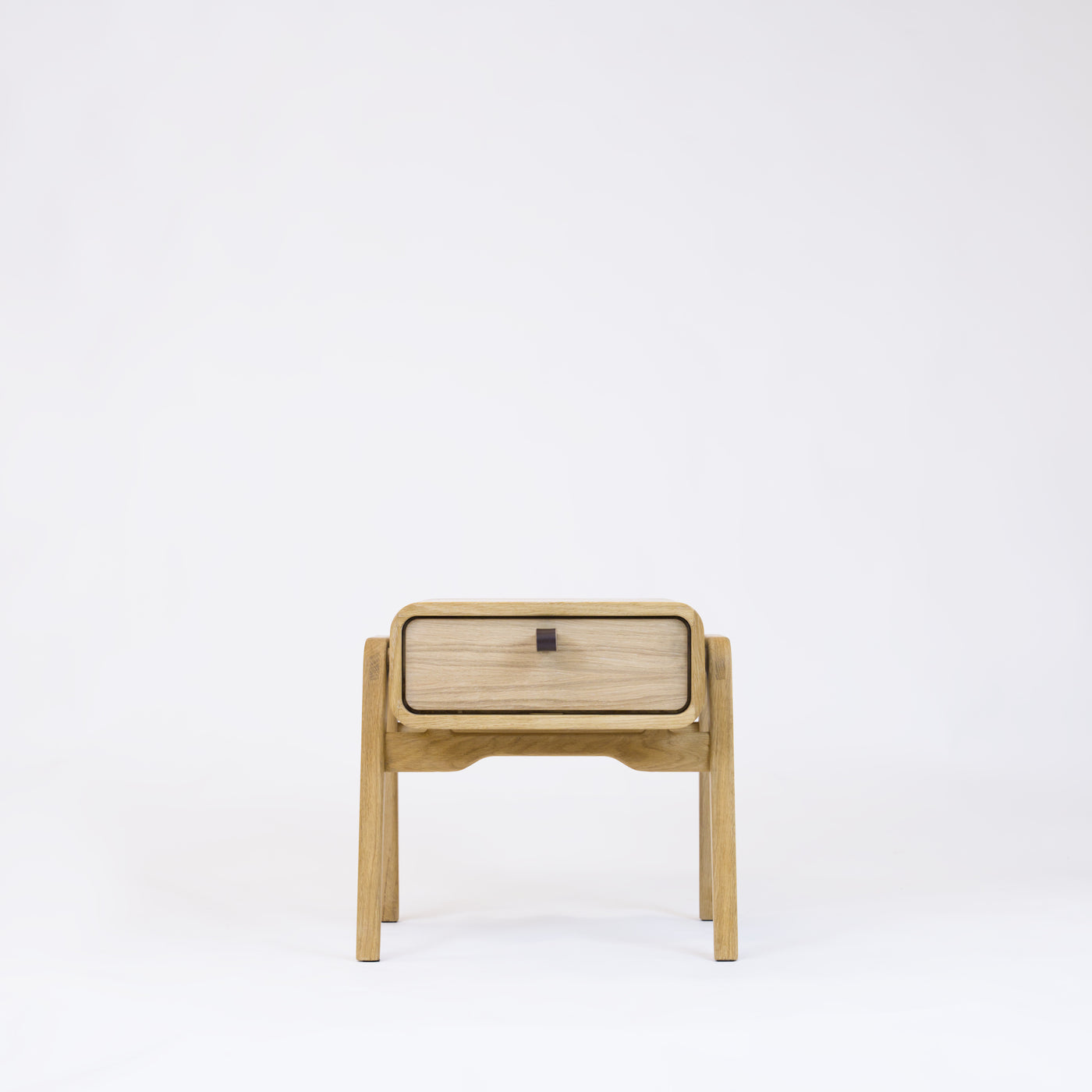Low nightstand nm11L. The main corpus is crafted from solid Norwegian oak, featuring 1 drawer with natural oak front.