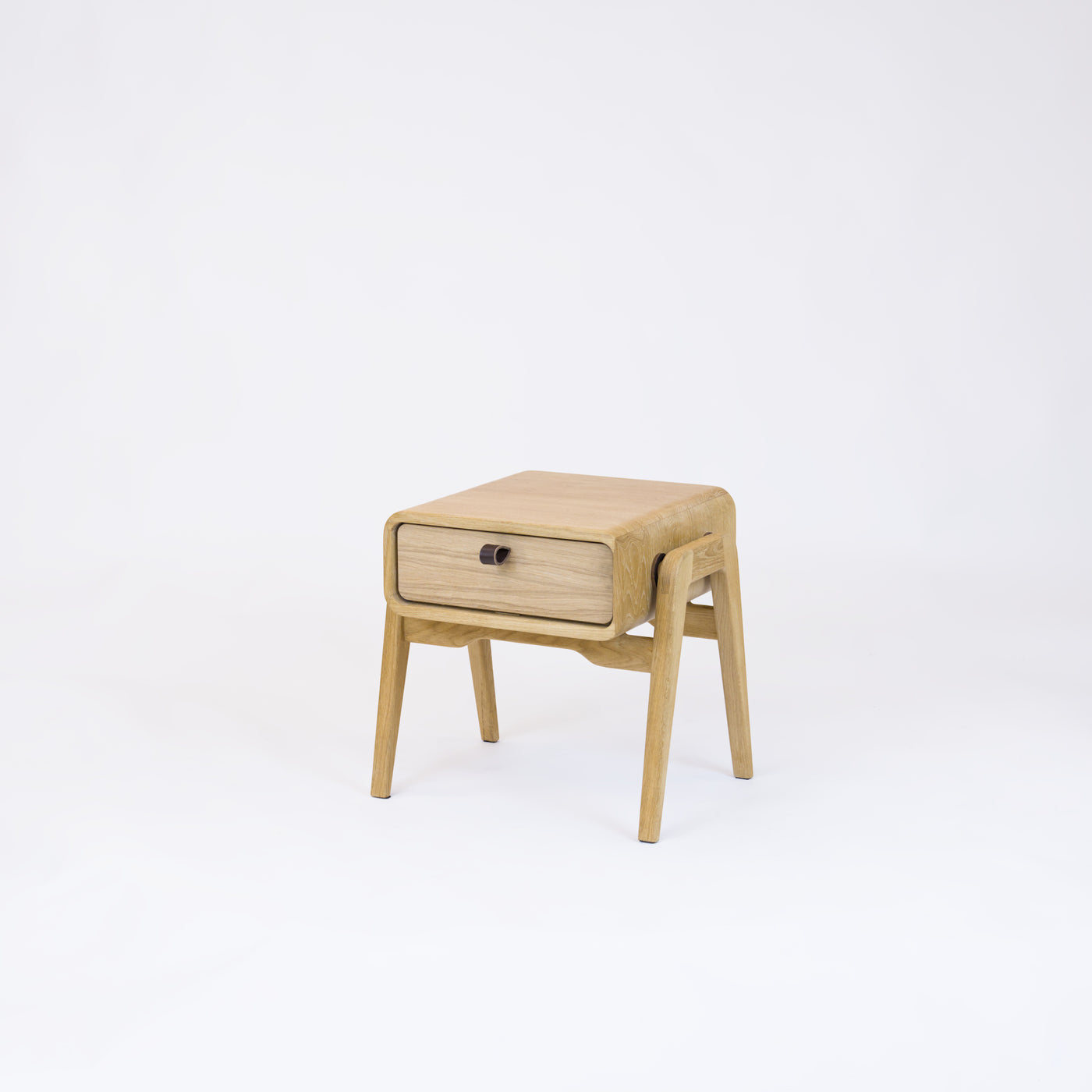 Low nightstand nm11L. The main corpus is crafted from solid Norwegian oak, featuring 1 drawer with natural oak front.