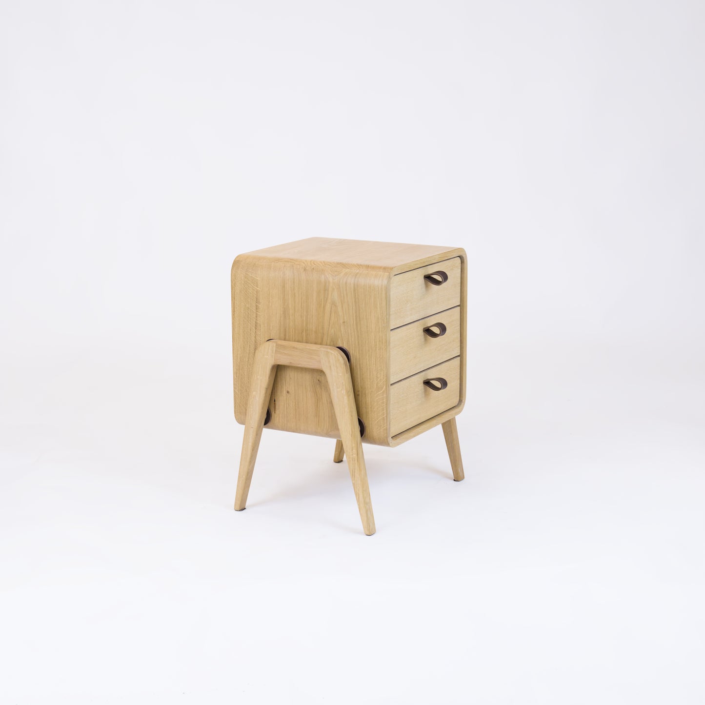 Low nightstand nm31L. The main corpus is crafted from solid Norwegian oak, featuring 3 drawers with natural oak front.