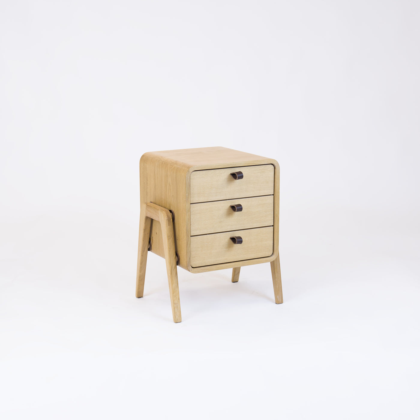 Low nightstand nm31L. The main corpus is crafted from solid Norwegian oak, featuring 3 drawers with natural oak front.