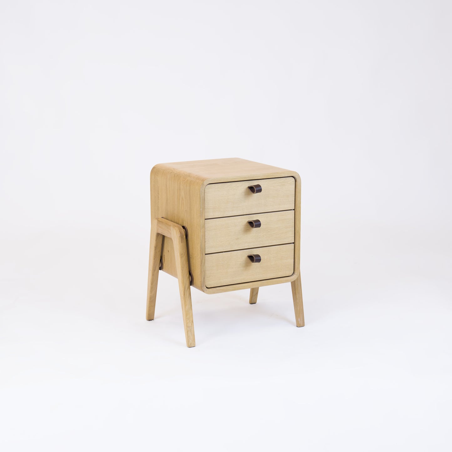 Low nightstand nm31L. The main corpus is crafted from solid Norwegian oak, featuring 3 drawers with natural oak front.