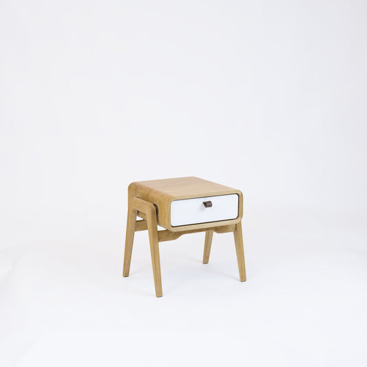 Low nightstand nm11L. The main corpus is crafted from solid Norwegian oak, featuring 1 drawer with white front.