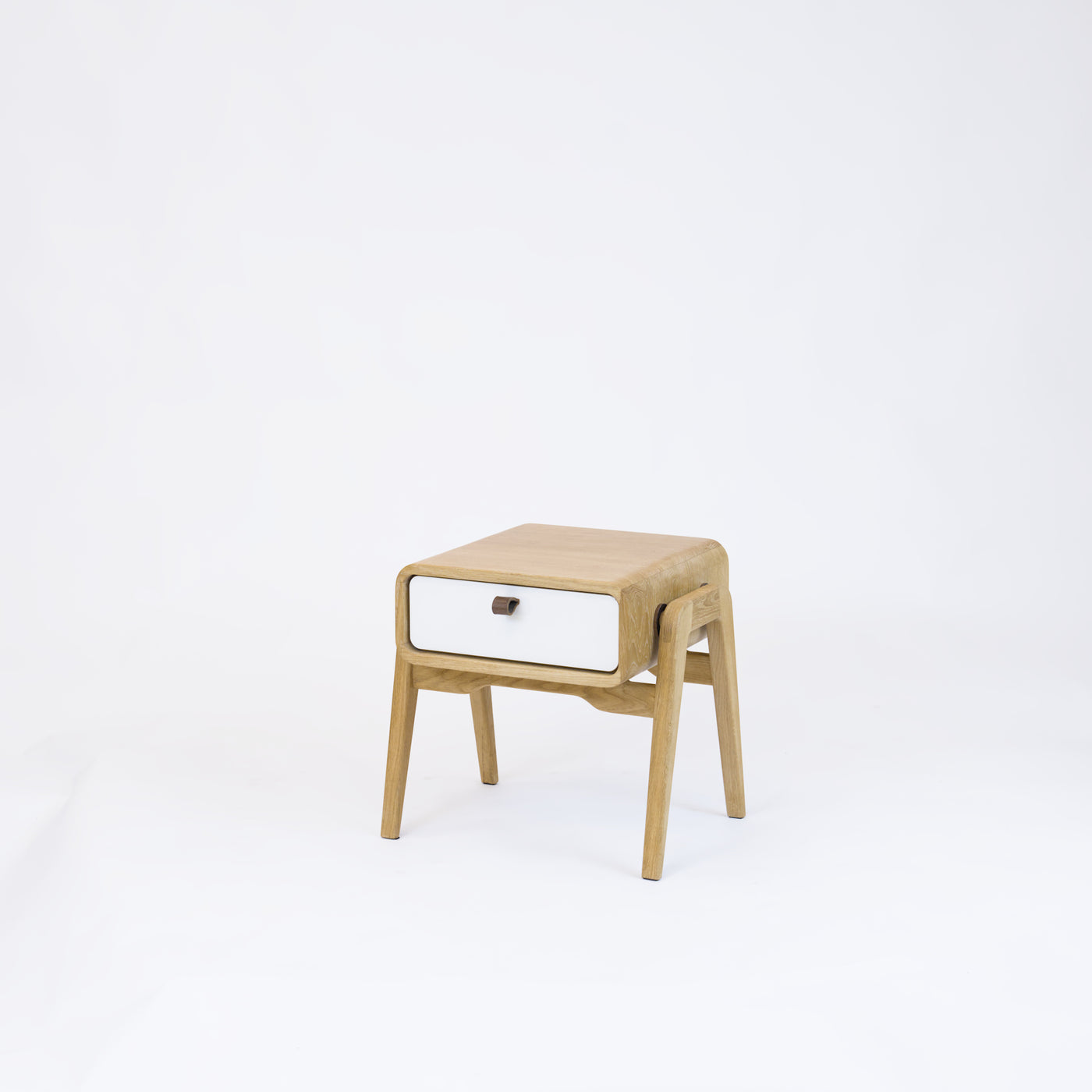 Low nightstand nm11L. The main corpus is crafted from solid Norwegian oak, featuring 1 drawer with white front.
