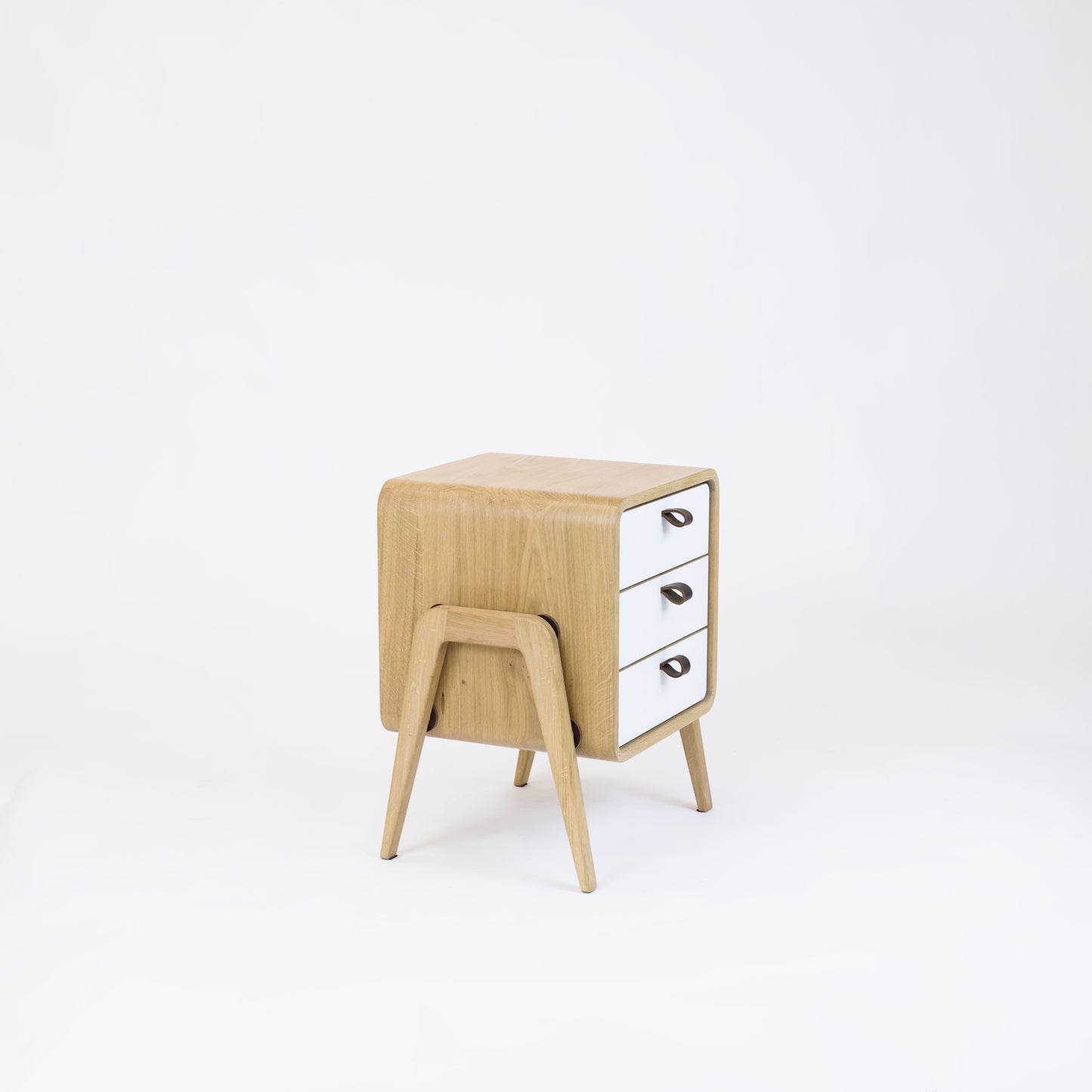 Low nightstand nm31L. The main corpus is crafted from solid Norwegian oak, featuring 3 drawers with white front.